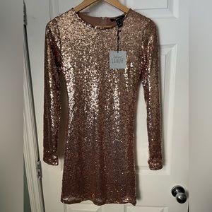 Uniquely coloured, golden La Nuit Revamped dress in size medium.
